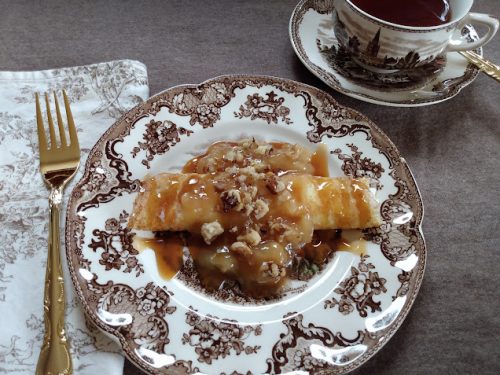 Brown dishes with Apple Crepe